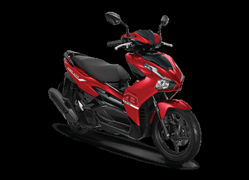 Một dãy xe Honda Wave Alpha 110 với nhiều màu sắc khác nhau (đỏ, xanh, trắng) được trưng bày tại một cửa hàng bán xe máy, khung cảnh tươi sáng.